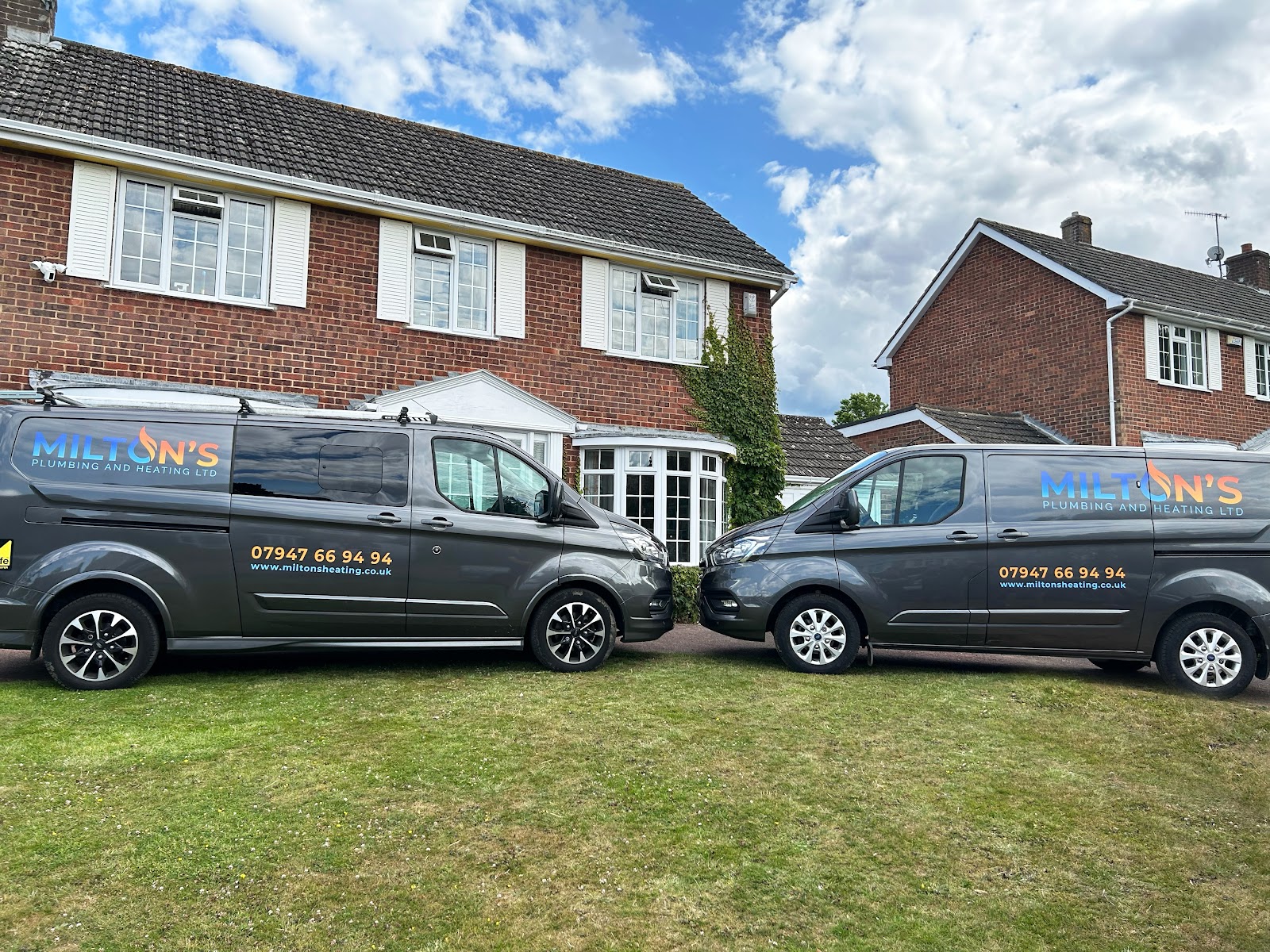 The Milton's vans, out on a job.